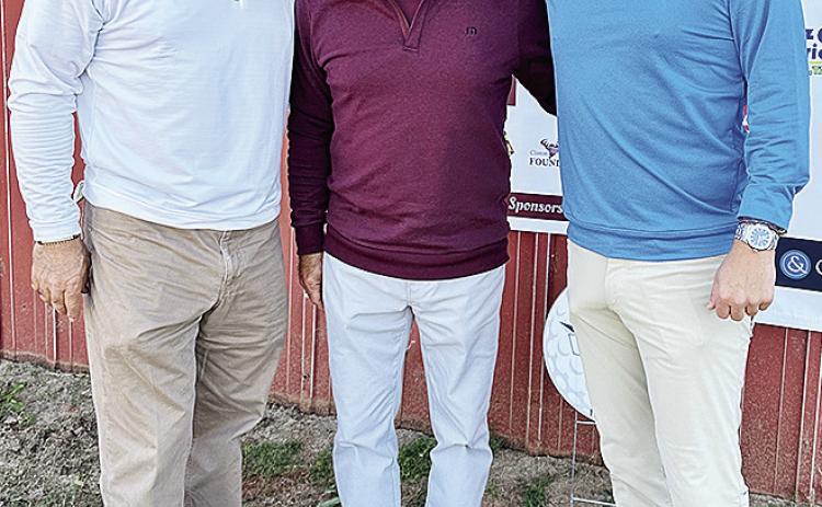 The winning team of the A Flight of the tournament consisted of, from left, Junior Simon, Floyd Simon Jr., and Clinton Simon. CDN | Courtesy photo