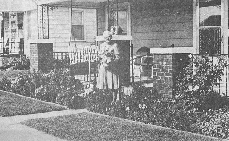 40 YEARS AGO Mrs. John (Lydia) Shaffer proudly held the basket of flowers she was awarded by the Clinton Chamber of Commerce Beautification Committee. Her home was singled out for the committee’s “Yard of the Week” honors.